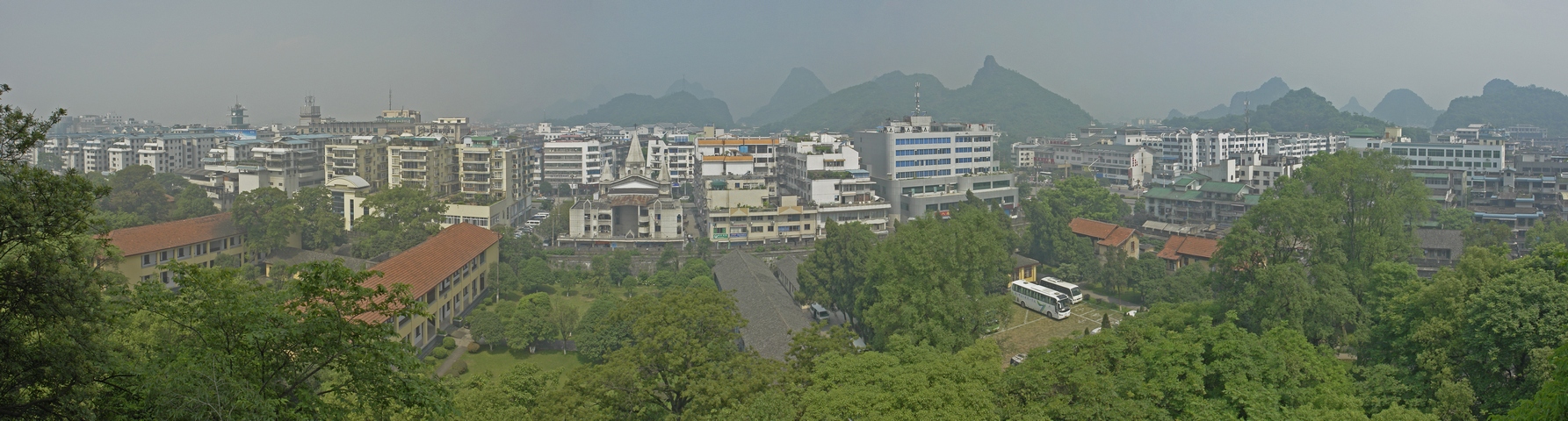 Guilin21.jpg - 4 images, Size: 9494 x 2553, FOV: 177.02 x 44.46, RMS: 2.66, Lens: Standard, Projection: Cylindrical, Color: None